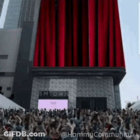 Crowd Gathered At SMTown Building GIF