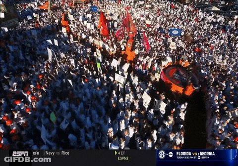 Crowd Gathered In Front Of ESPN Sign GIF