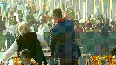 Crowd Gathered In Front Of Krhp Building GIF