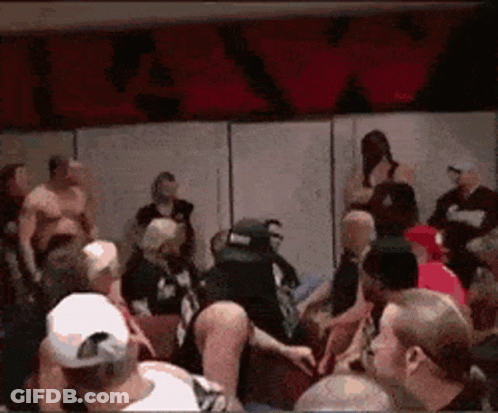 Crowd Gathered In Room With R&A Sign GIF