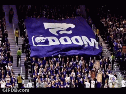 Crowd Holding Blue Banner Saying Doom GIF