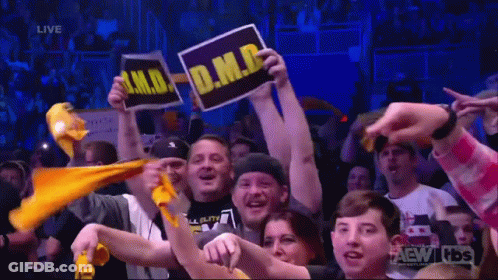 Crowd Holding D.M.B. Signs GIF