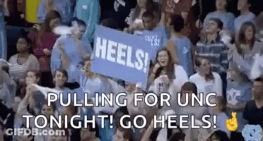 Crowd Holding Heels Sign In Stadium GIF
