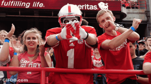 Crowd Holding Signs Saying Game Day GIF