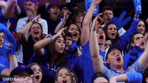 Crowd In Blue Shirts Saying Runners GIF