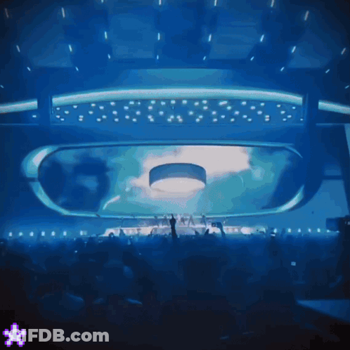 Crowd In Dark Room With Blue Light GIF