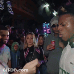 Crowd In Dark Room With Soda Can GIF