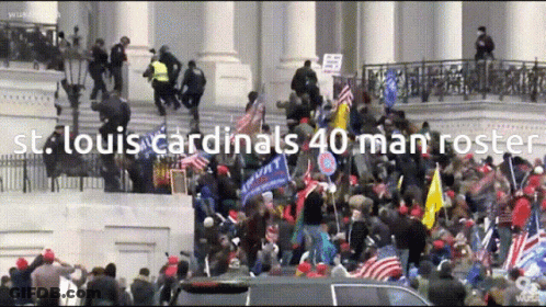 Crowd In Front Of Building With St. Louis Cardinals 40 Man Roster GIF