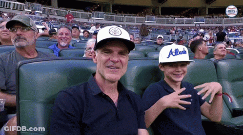 Crowd In Front Of Screen Saying Stanley GIF