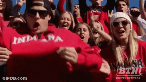 Crowd In Red Indiana Sweatshirts Cheering GIF