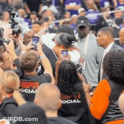 Crowd In Stadium With Person Wearing Social Shirt GIF