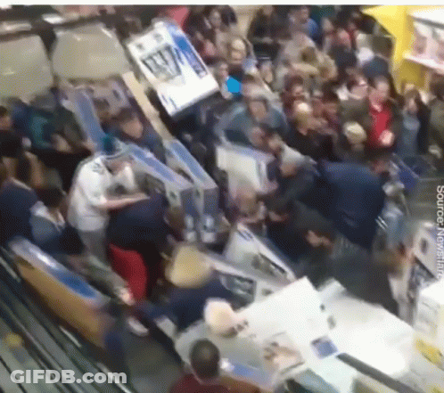Crowd In Store With AA Sign GIF
