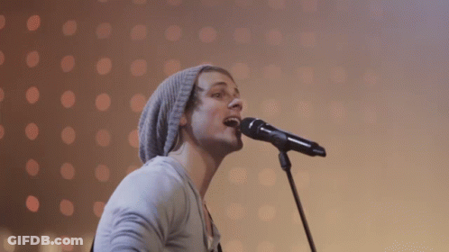 Crowd Raising Hands With I Love You Bracelet GIF