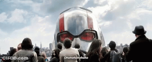 Crowd Standing In Front Of Giant Ant-Man Helmet GIF