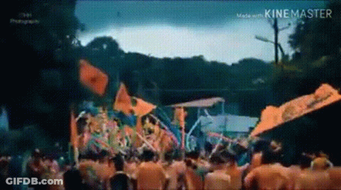 Crowd Standing In Front Of Stage At Carnival GIF