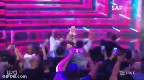 Crowd Standing In Front Of Stage Saying Sap GIF