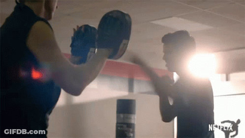 Crowd Standing With Arms In The Air GIF