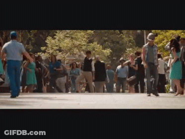 Crowd Walking Down Park Street GIF