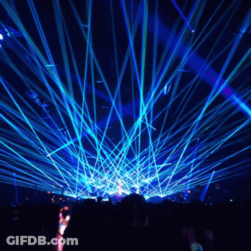 Crowd Watching Concert With Blue Lights GIF
