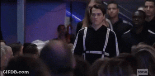 Crowd Watching Model Walk Runway GIF