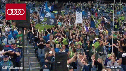 Crowd Watching Soccer Game With Fox Deportes Logo GIF