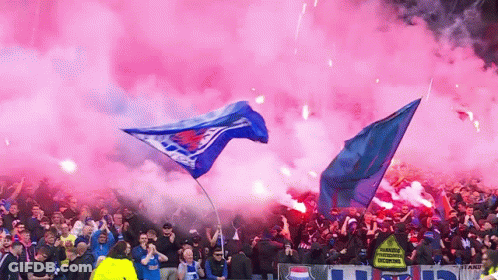Crowd Watching Soccer Game With Smoke And Stand Sign GIF