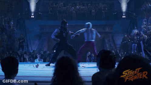Crowd Watching Street Fighter Wrestling Match GIF