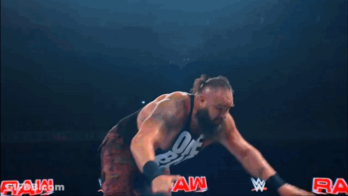 Crowd Watching Wrestling Match With WWE Shirt GIF