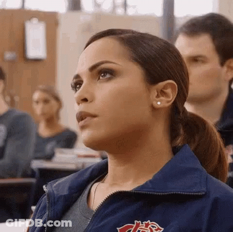 Crowd With Man Wearing Uf Shirt GIF