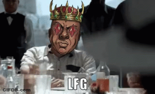 Crowned Man Playing Cards At Table With Glasses GIF