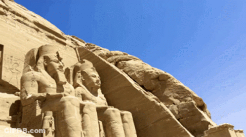 Crowned Man Statue On Rock GIF