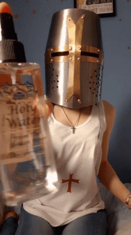 Crusader Girl Sprays Holy Water Perfume GIF
