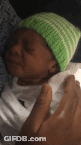 Crying Baby In Green Hat GIF