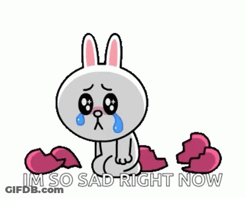 Crying Cartoon Rabbit Sitting On Broken Heart GIF
