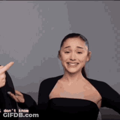 Crying Laughing Ariana Grande Wiping Tears GIF