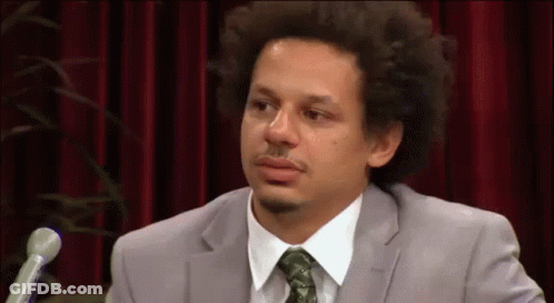 Crying Man In Suit And Tie At Microphone GIF