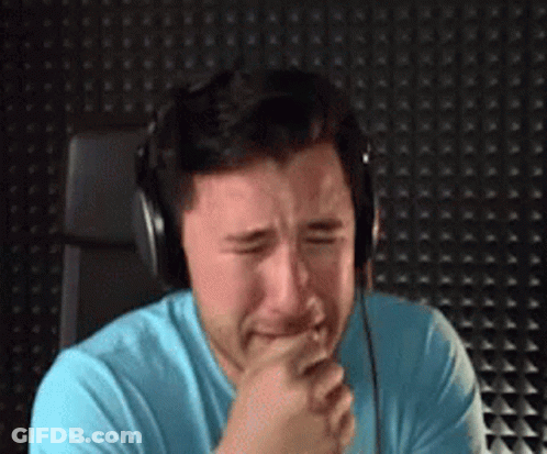 Crying Man With Blue Shirt And Headphones GIF