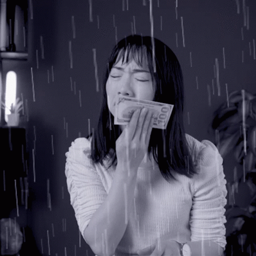 Crying With Money While Raining GIF