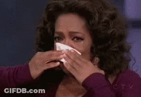 Crying Woman Holding Napkin GIF