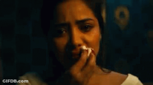 Crying Woman Holding Paper GIF