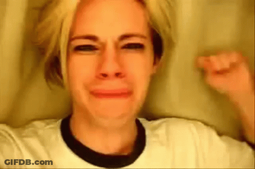 Crying Woman Making Funny Face In White Shirt GIF