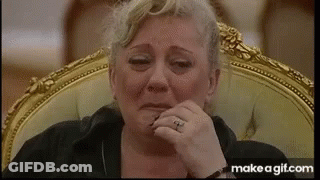Crying Woman With Hand To Face GIF