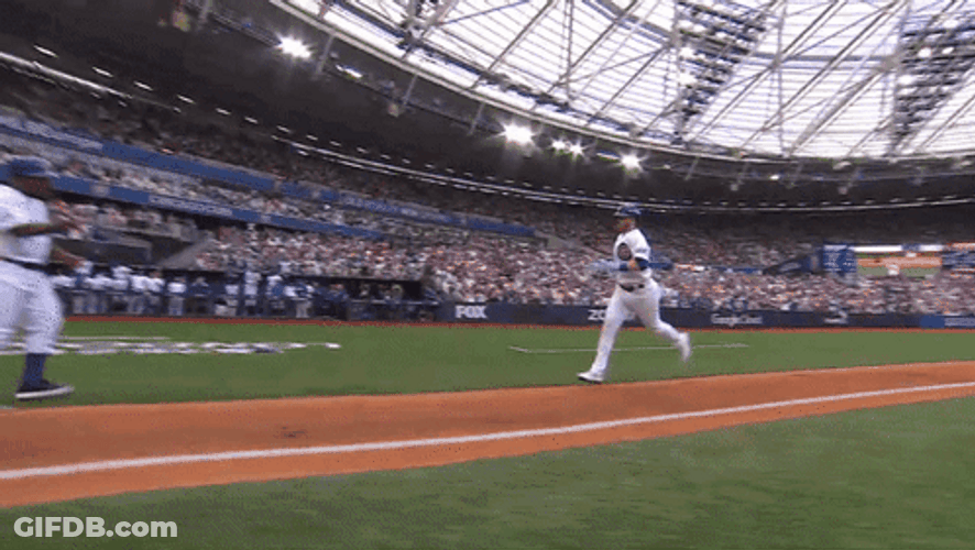 Cubs Player Ian Happ Running To Base After Win GIF