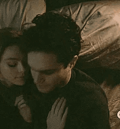 Cuddling And Snuggling Couple GIF