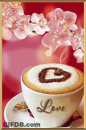 Cup Of Cappuccino With Heart Drawn On Foam GIF