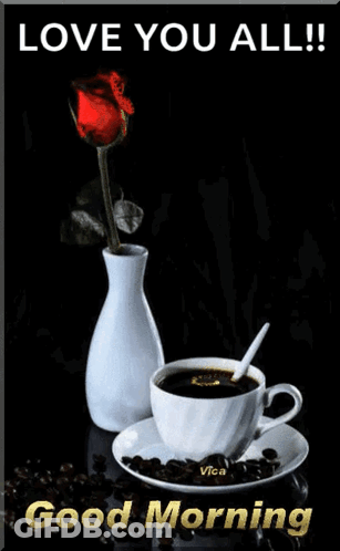 Cup Of Coffee Next To Rose Vase GIF