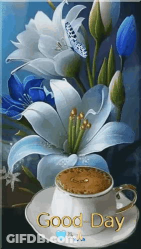Cup Of Coffee On Saucer Next To Blue Flower GIF