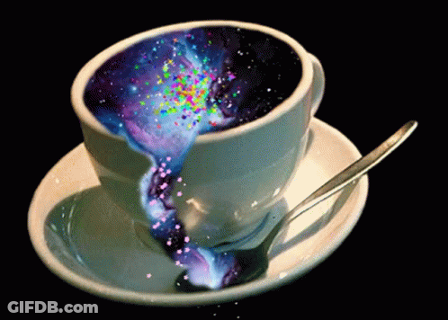 Cup Of Coffee With Galaxy Inside And Saucer With Spoon GIF