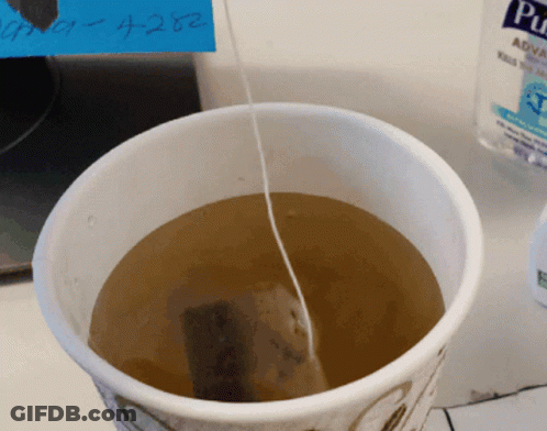 Cup Of Tea With Tea Bag And Pure Aqua Bottle GIF