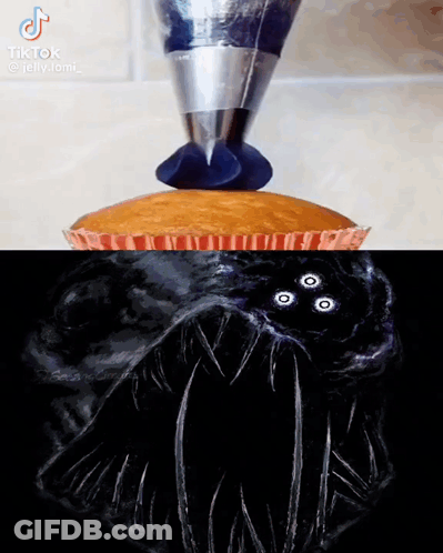 Cupcake With Blue Frosting And Three-Eyed Monster GIF